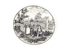An interesting 19th Century pottery plate, decorated with figure fishing and ladies with baskets;
