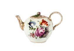 A Meissen bullet shaped tea pot, decorated with foliate sprays heightened in gilt, the lid with