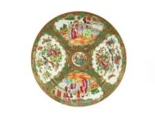 A pair of Canton plates decorated in the traditional manner; an Oriental hardwood panel with applied