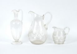 A 19th Century etched glass claret jug, with butterfly, bee and floral decoration on a circular