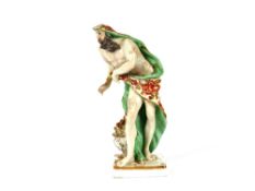 A late 18th / early 19th Century allegorical porcelain figure, depicting winter, 13cm high