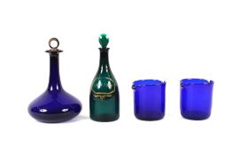 A 19th Century blue glass ships style decanter, having white metal mounted stopper; a pair of blue