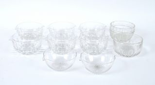 A set of six 19th Century double lipped wine glass rinsers; a pair of similar with star cut bases;