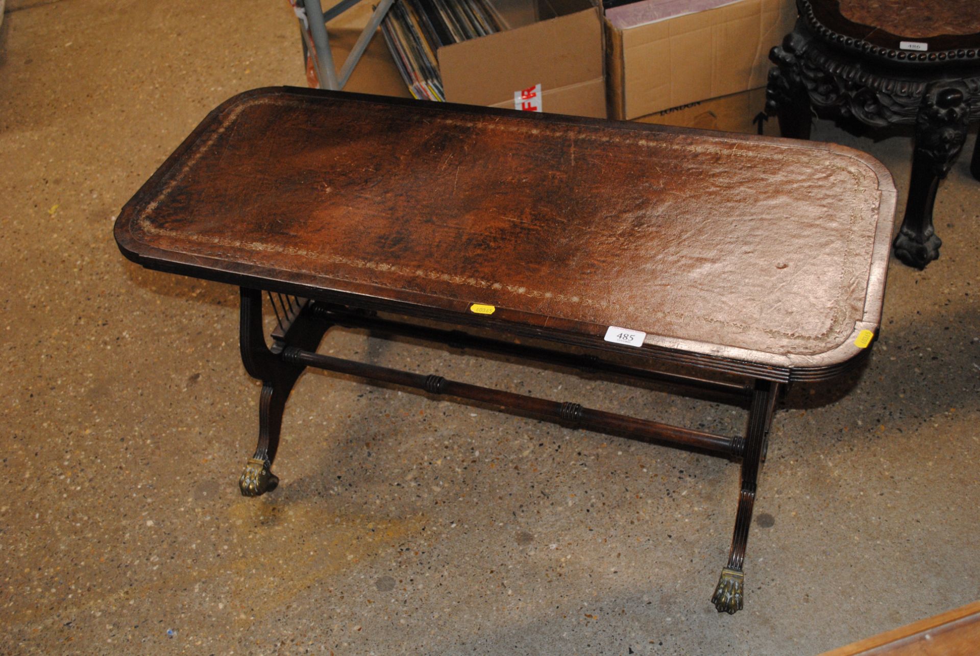 A reproduction mahogany oblong coffee table