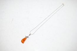 A 925 silver and amber pendant necklace