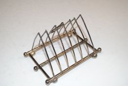 A silver plated folding toast rack AF