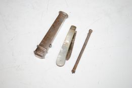 A white metal seal case set with turquoise stone;