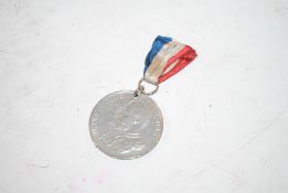 A Silver Jubilee medallion 6th May 1935
