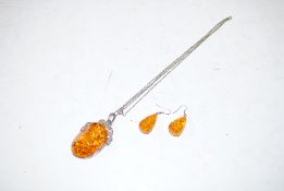 A faux amber necklace and earrings