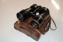 A leather cased pair of Bino Prism No.5 MkII binoc