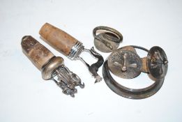 A box containing a white metal figural decorated b