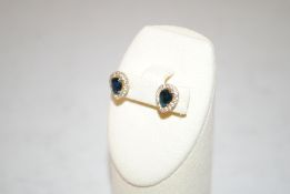A pair of 925 silver sapphire coloured earrings