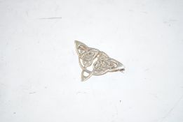 A Celtic detail sterling silver brooch