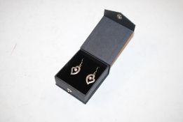 A pair of 925 silver and pink stone drop earrings