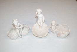 Three continental porcelain blanc de chine cherub
