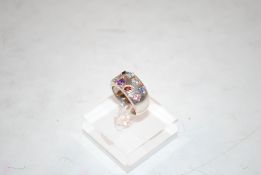 A sterling silver multi gem stone ring including r
