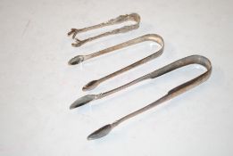 Three pairs of silver sugar tongs, 87.5gms