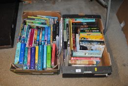 Two boxes containing various children's books and