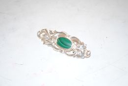 A 1988 C. W. Sellors sterling silver and malachite