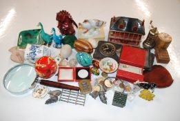 A box containing various decorative china to inclu
