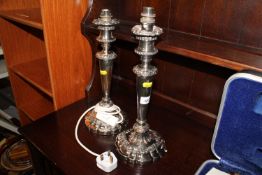 A pair of silver plated table lamps