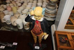 A reproduction doorstop in the form of Mr Pickwick