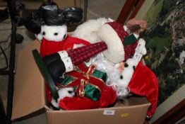 A box containing various Christmas decorations