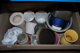 A box containing a quantity of vases and jardinièr