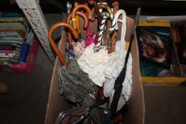 A box containing various umbrellas, parasols and