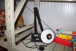 A Micromark desk lamp with detachable base