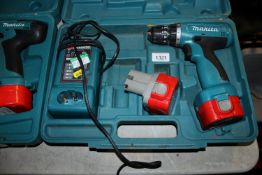A Makita 6270D cordless 12volt drill; two Makita P