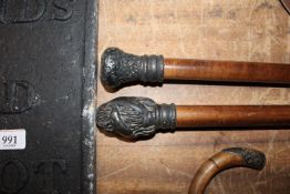 Two silver plated handled walking sticks, one havi