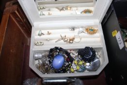 A jewellery box and contents of various costume je