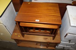 A nest of G-plan style tables together with a pine