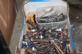 A box containing various cutlery