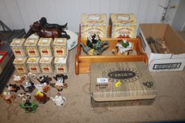 A quantity of various Tiny teapots, a wooden hanging wall shelf, etc.