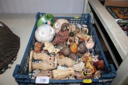 A box containing various owl ornaments