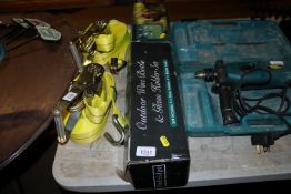 An Oxbridge outdoor wine bottle and glass holder s