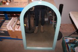 A modern framed wall mirror