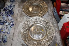 Two silver plated trays depicting Henry VIII and Q