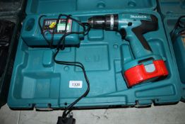 A Makita 8391D cordless electric drill; a Floureon