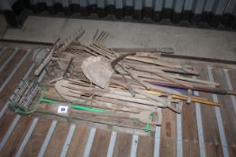 Quantity of long handled tools etc.