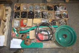 Pallet containing a large quantity of Kverneland LB85 fasteners and unused spares.