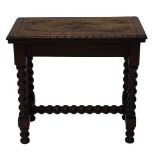 A 19thC carved oak fold over card table, the top with flower head and leaf carving, with a carved