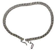 A diamond tennis bracelet, set with illusion set tiny diamonds, stamped 925, retailer's box for