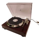 A Denon DP-47L automatic arm lift direct drive turntable system, with rosewood case and smoked