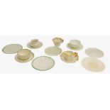 A quantity of Belleek teaware, to include second period cup and saucer with peach coloured border,