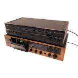 A Denon precision audio component stereo cassette deck, and an A&R Cambridge tuner.