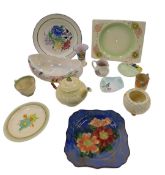 A group of early 20thC pottery, including a Clarice Cliff spring crocus pattern teacup and tea