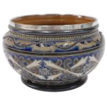 A Doulton Lambeth bowl, with sgrafitto decoration of scrolls, crosses, and roundels, in shades of